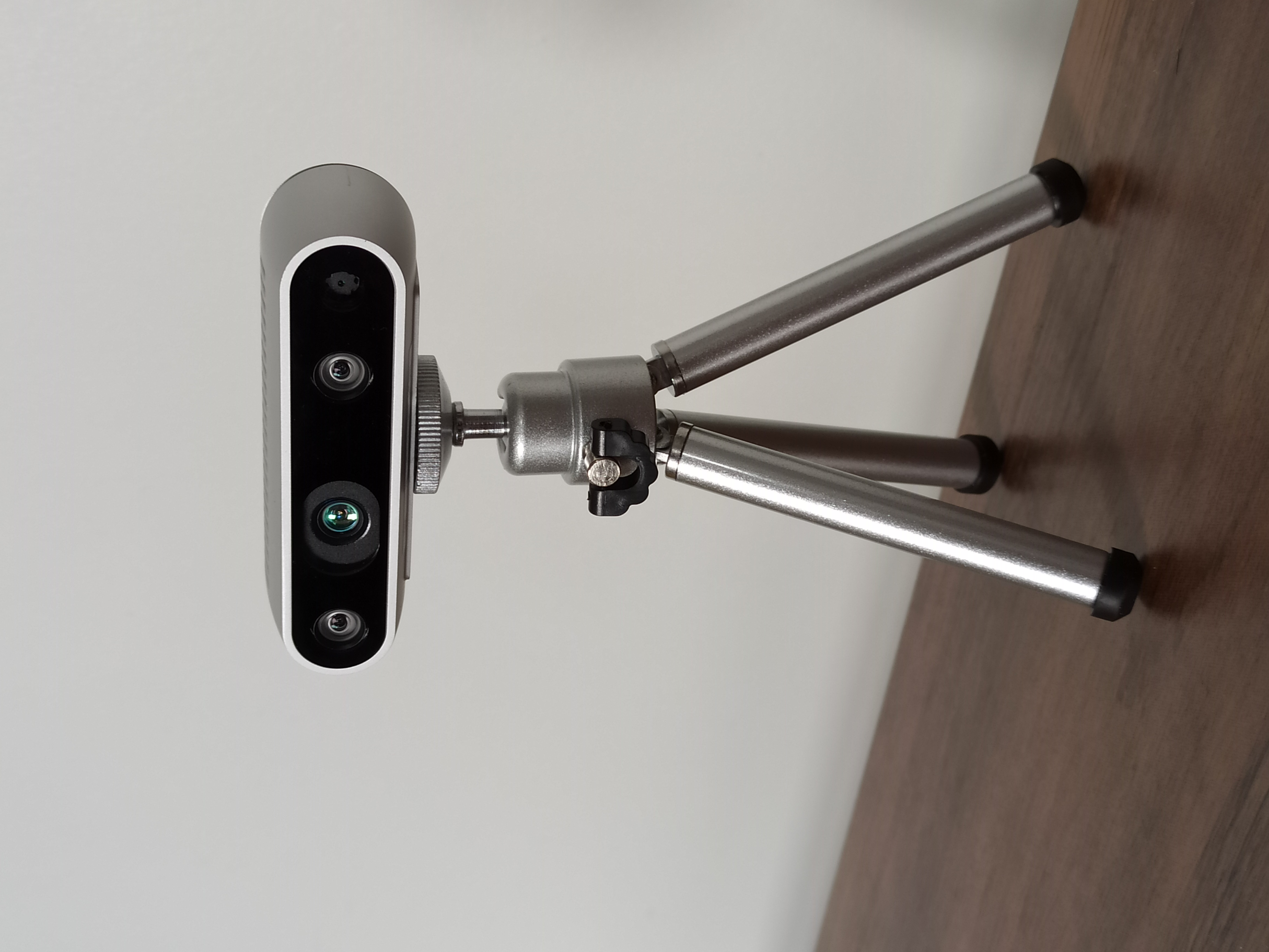 Intel RealSense D435 depth camera on a tripod.