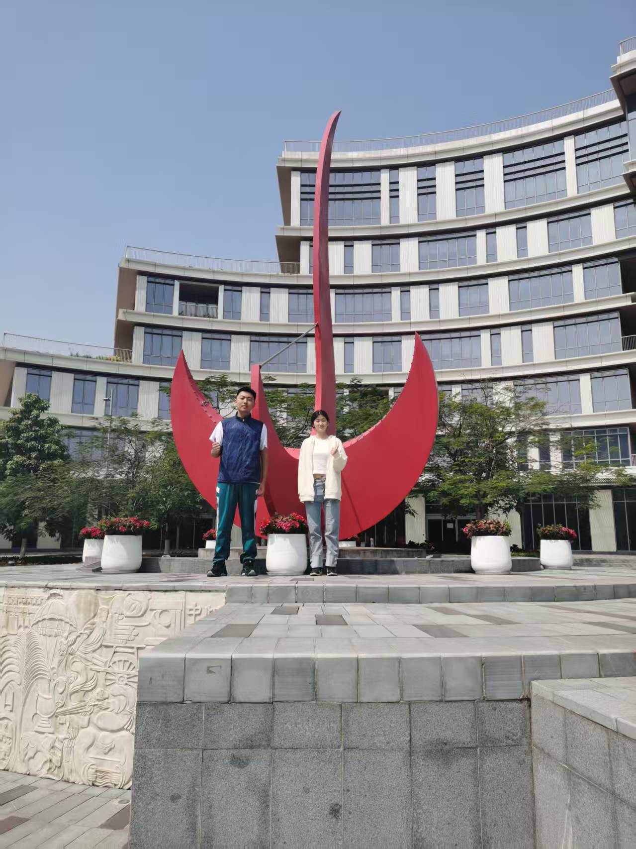 The two project members posing together outdoors.